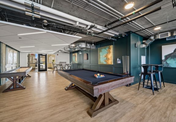 a game room with a pool table and ping pong table at Lakeview 3200 Apartments, Chicago, IL, 60657