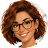 A woman with brown hair and glasses smiles at the camera.