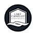 Lake Camelot Apartments logo with a house and waves.