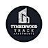 A logo for Tymberwood Trace Apartments featuring a stylized tree trunk.
