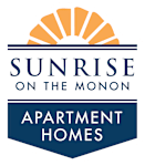 A logo for Sunrise on the Monon Apartment Homes.