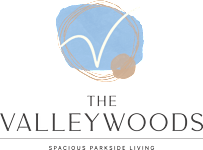The image is a logo for a parkside living named The Elmwoods.