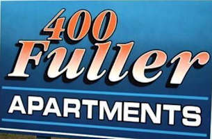 A blue sign with the text "400 Fuller Apartments" in white and orange.