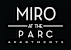 A black and white image of a sign that says "MIRO at the PARC Apartments".