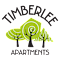 Timberlee Apartments logo with trees and a spiral design.