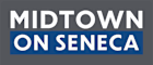 A blue and white sign that says "MIDTOWN ON SENECA".