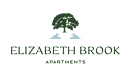 a logo with a tree on a green