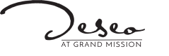 A logo with the text "Deseret" in cursive font.