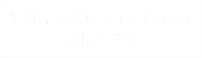 A green sign with white text that reads "The Scottsdale Grand.".