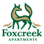A logo for Foxcreek Apartments featuring a stylized fox.