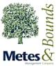 A logo with a tree and the words Metes and Bounds.