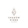 a logo for shadow ridge apartments