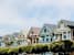 a row of houses in front of each other