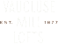 A green sign with white text that reads "VAUCLUSE MILL 1877 LOFTS".