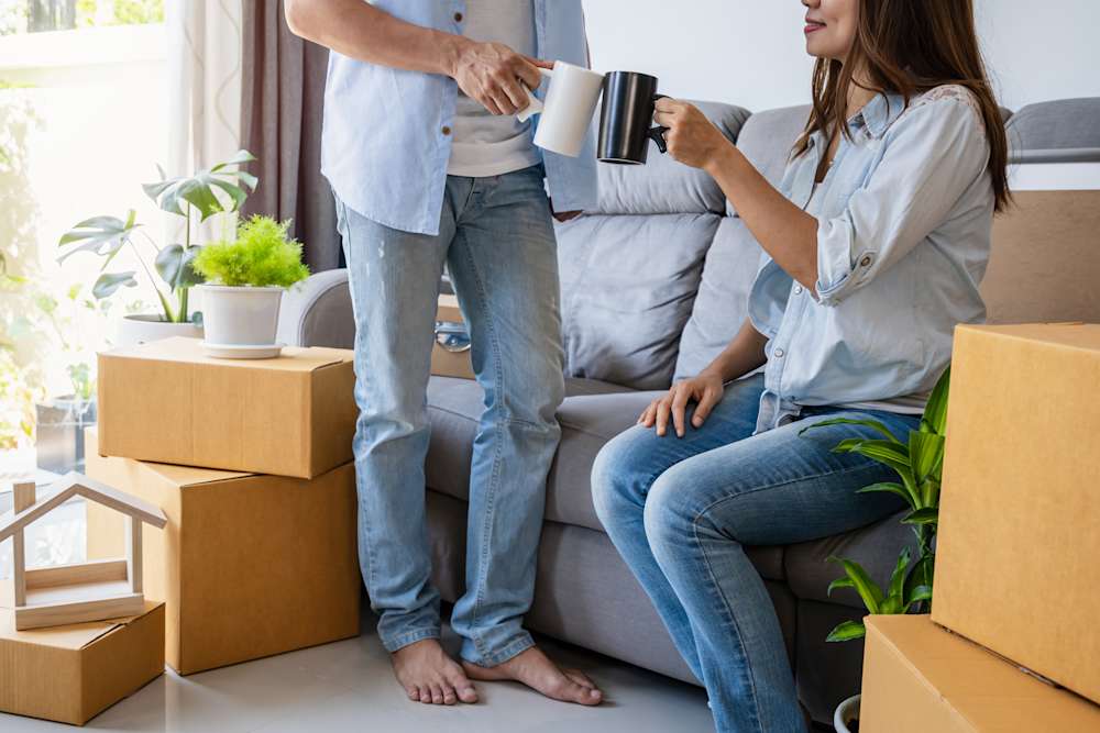 Couple moving into their new apartment
