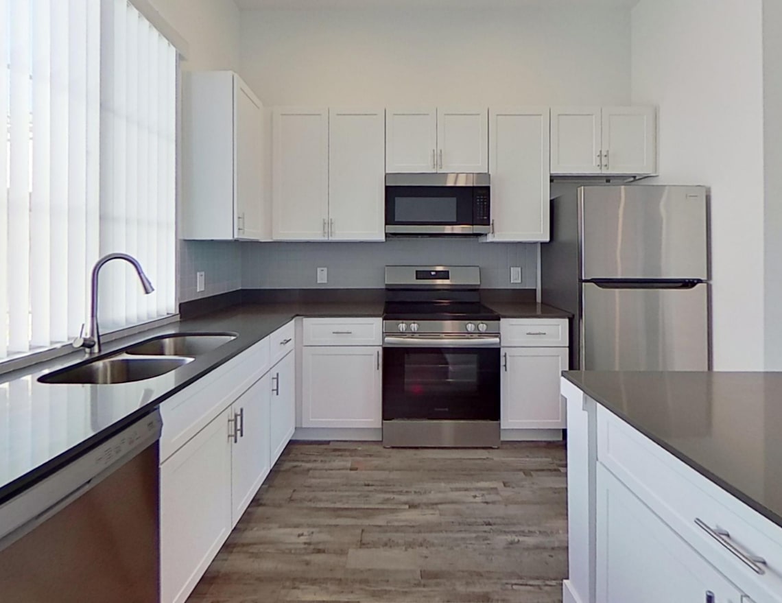 Apartment kitchen — representative home at Allero 59.