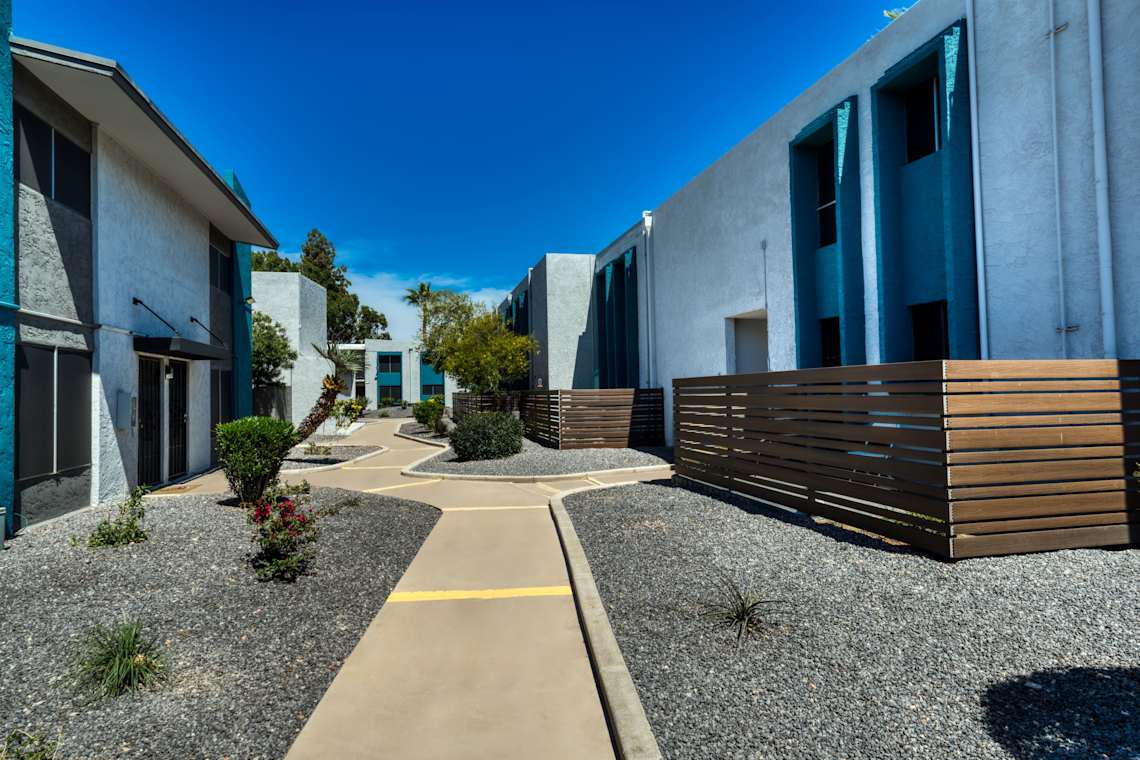 Building exterior at Connect on Missouri Apartments.