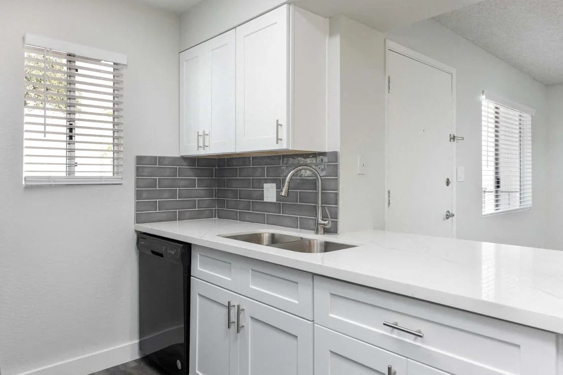 Apartment kitchen at Camelback Cove Apartments.