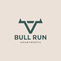 Bull run apartments logo with green bull head.