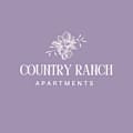A logo for Country Ranch Apartments with a flower design.