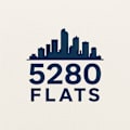 A graphic with a city skyline and the text "5280 FLATS" in front of it.