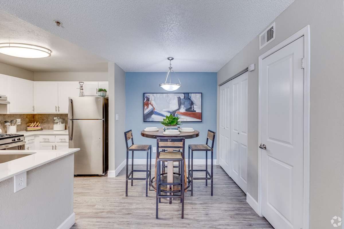 Furnished dining area shown — representative home at Sterling Point Apartment Homes.