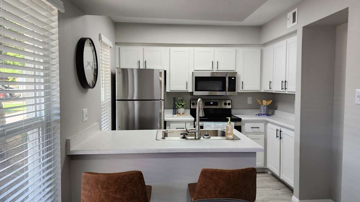 Apartment kitchen — representative home at Ascent on Peoria.