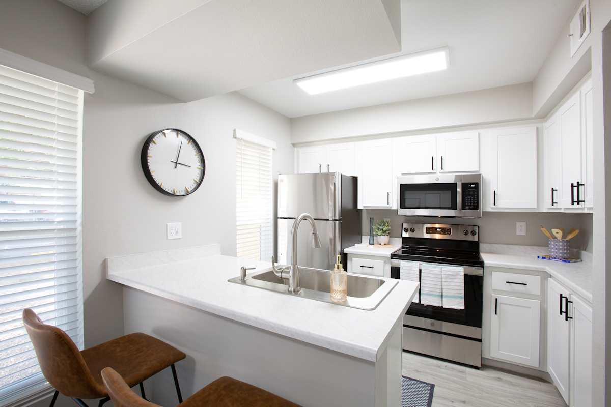 Apartment kitchen — representative home at Ascent on Peoria.