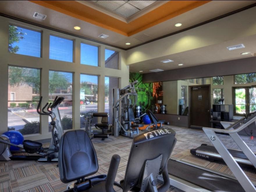 Fitness room at San Riva At The Foothills.