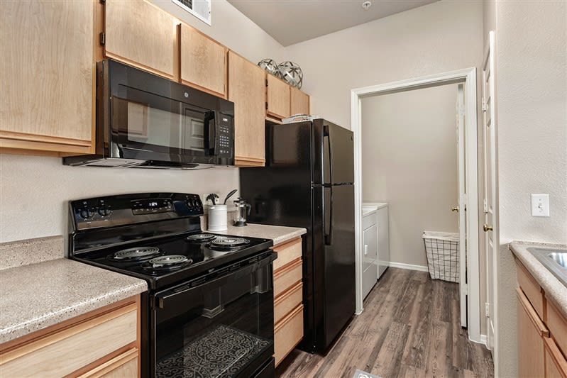 Apartment kitchen — representative home at San Riva At The Foothills.