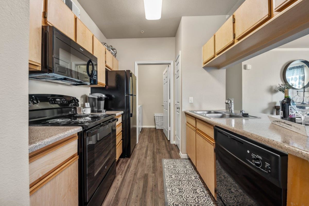 Apartment kitchen — representative home at San Riva At The Foothills.