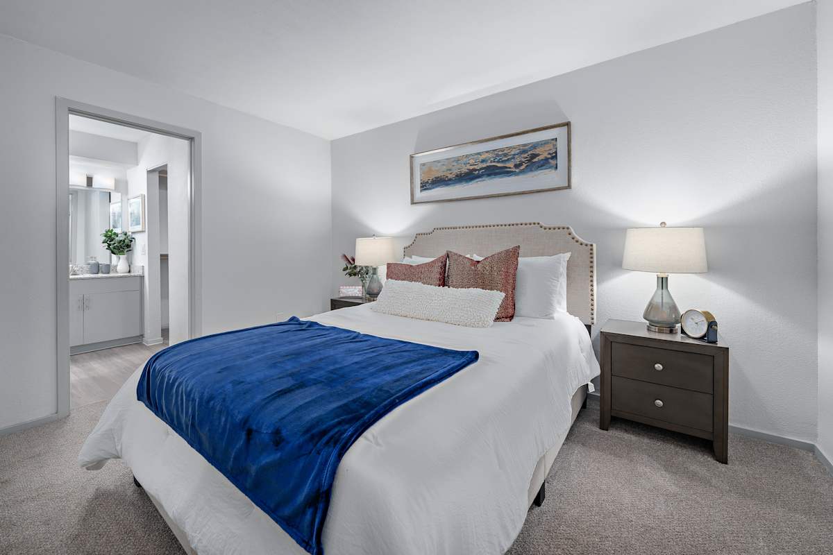 Furnished bedroom shown — representative home at The Halifax.