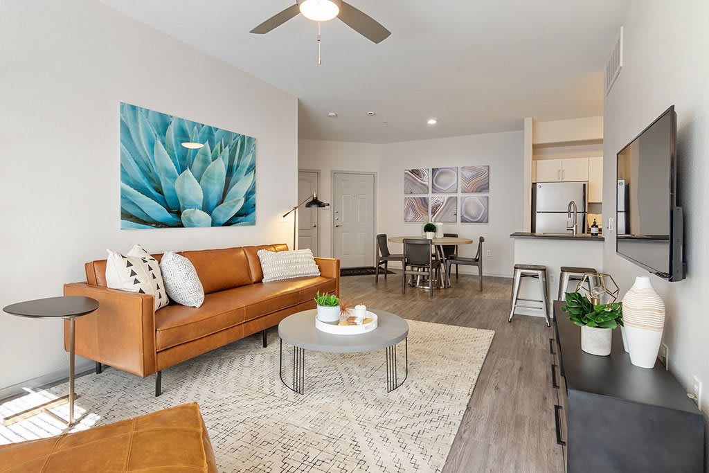 Furnished apartment living area shown — representative home at Element Deer Valley.