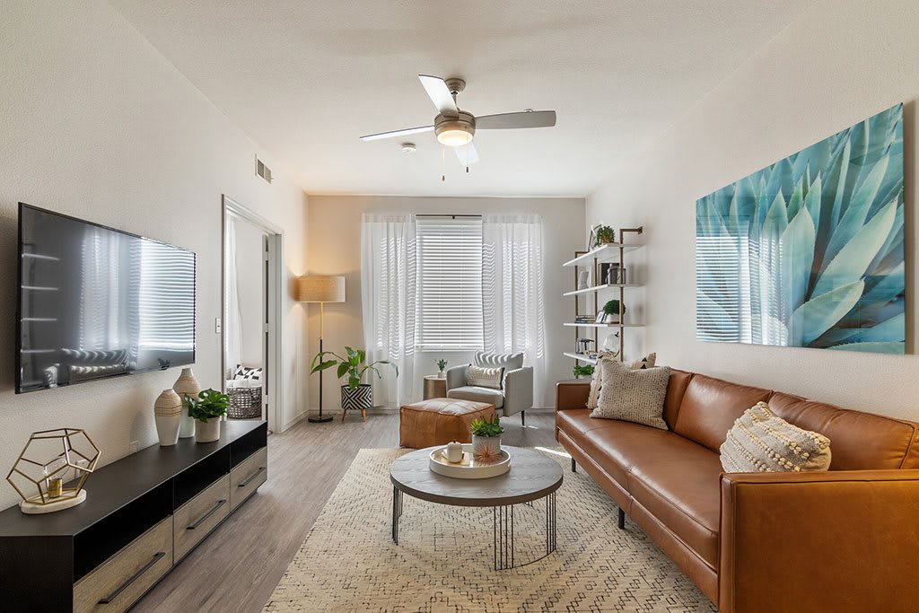 Furnished apartment living area shown — representative home at Element Deer Valley.
