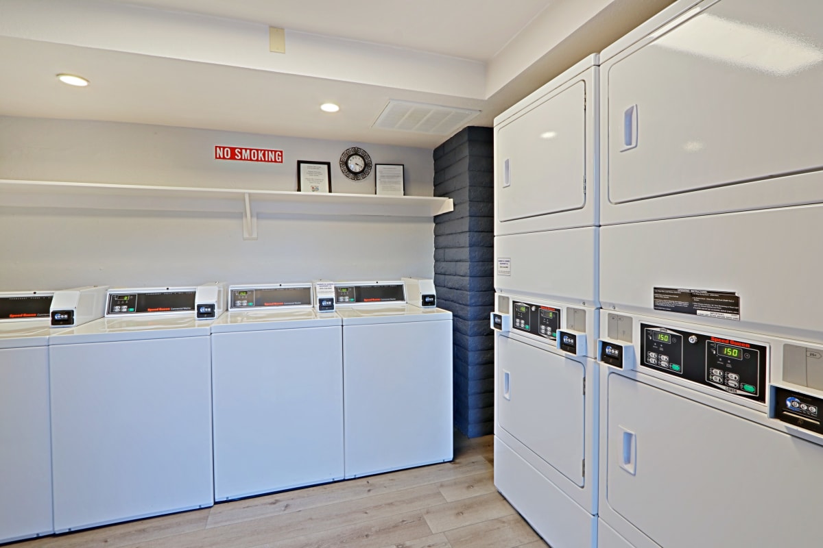 Shared laundry room at Allora Phoenix Apartments.
