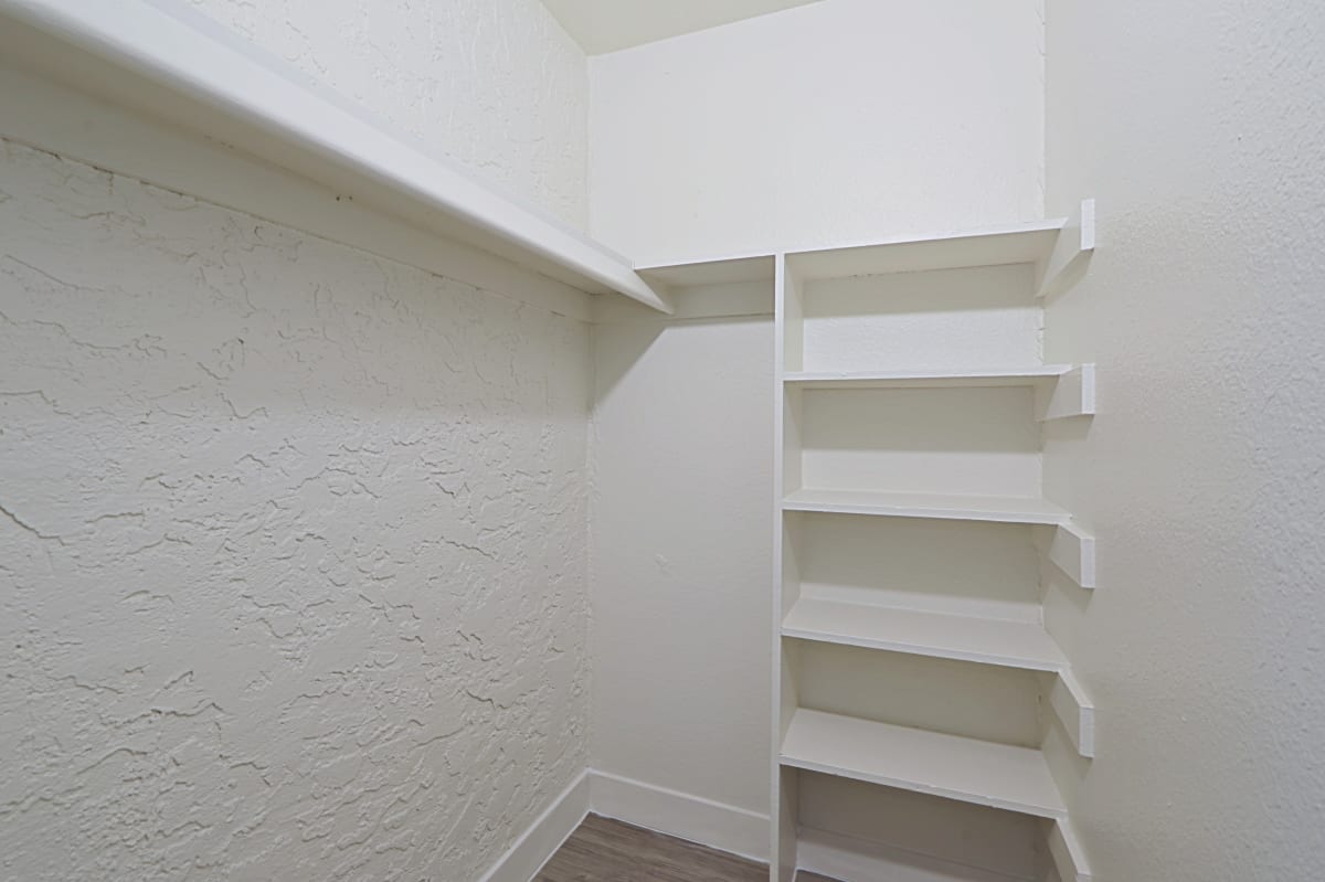 Walk-in closet — representative home at Allora Phoenix Apartments.