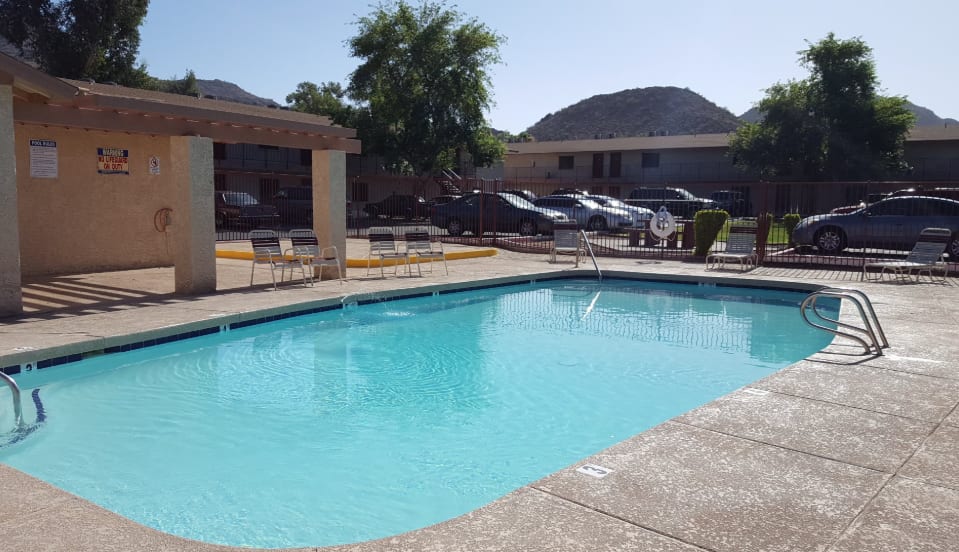 Pool and poolside area at Foothills Court Apartments.