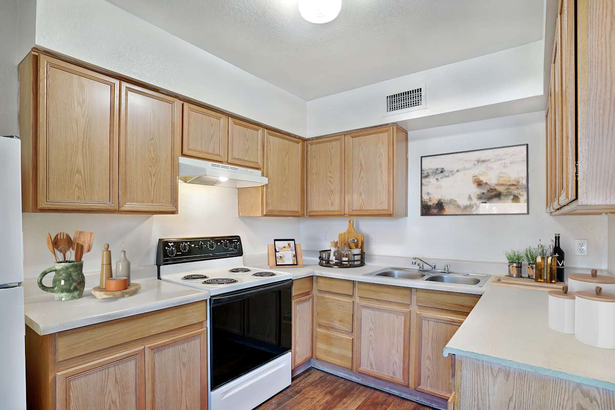 Apartment kitchen — representative home at Foothills Court Apartments.