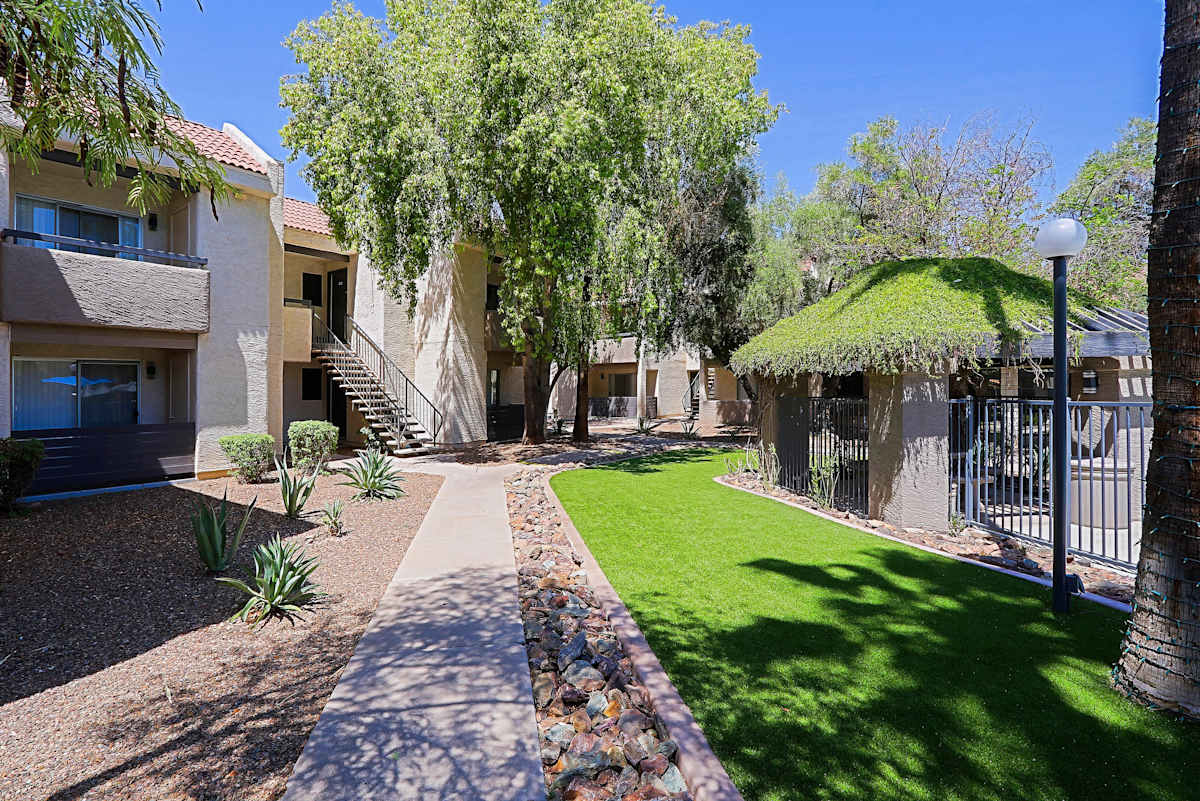 Courtyard walkway by the pool at Northerly Apartments.