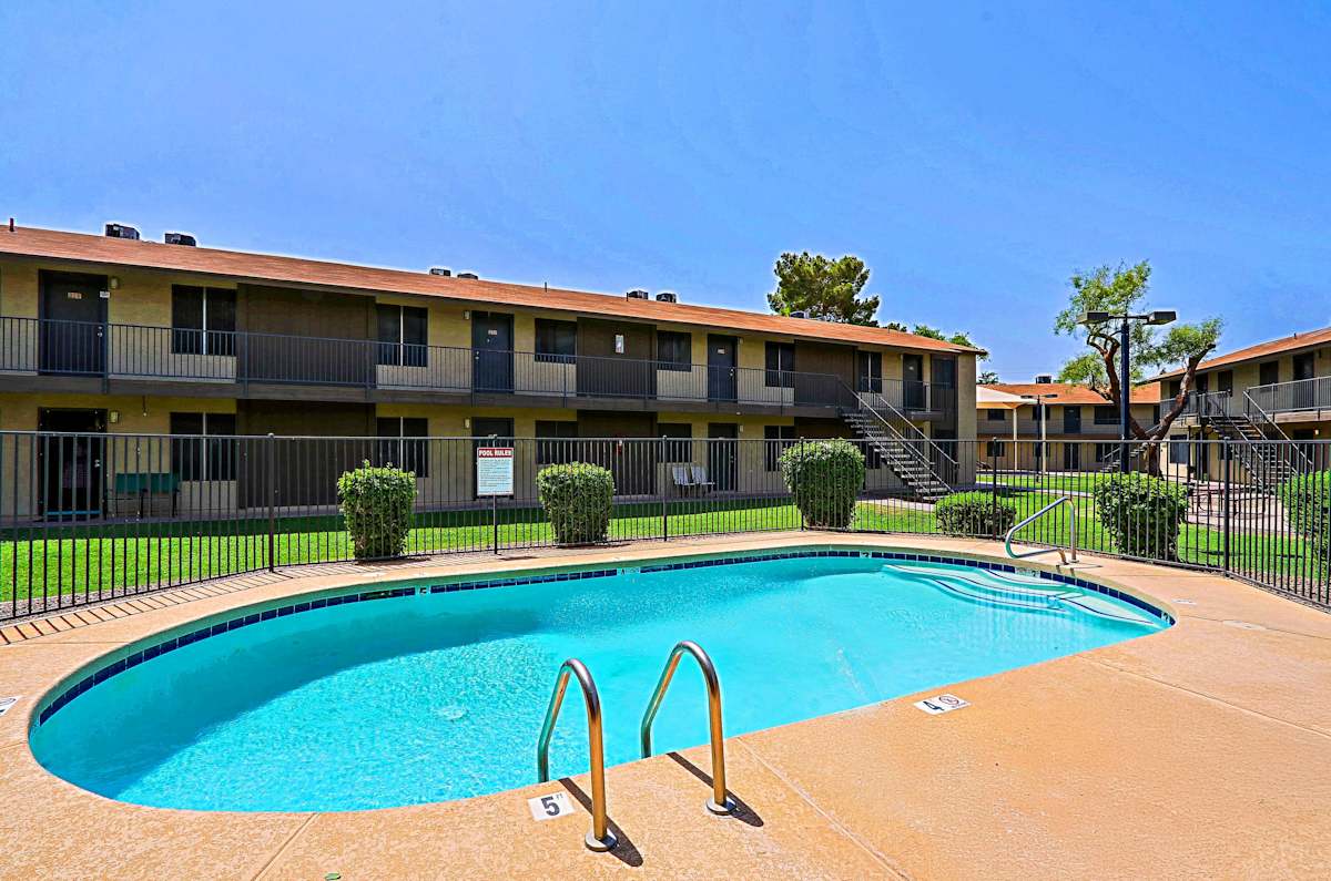 Pool and poolside area at Sahuaro West Apartments.