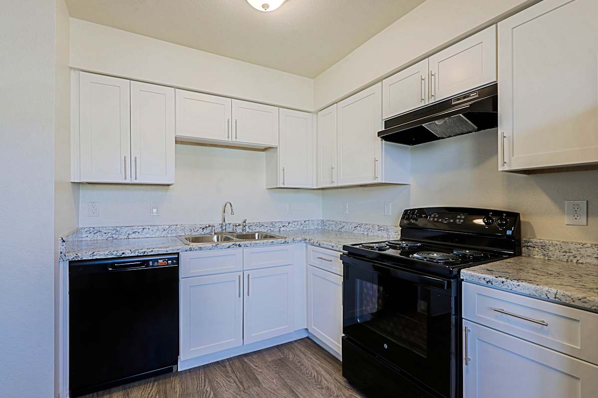 Apartment kitchen — representative home at Cinnabar Square.