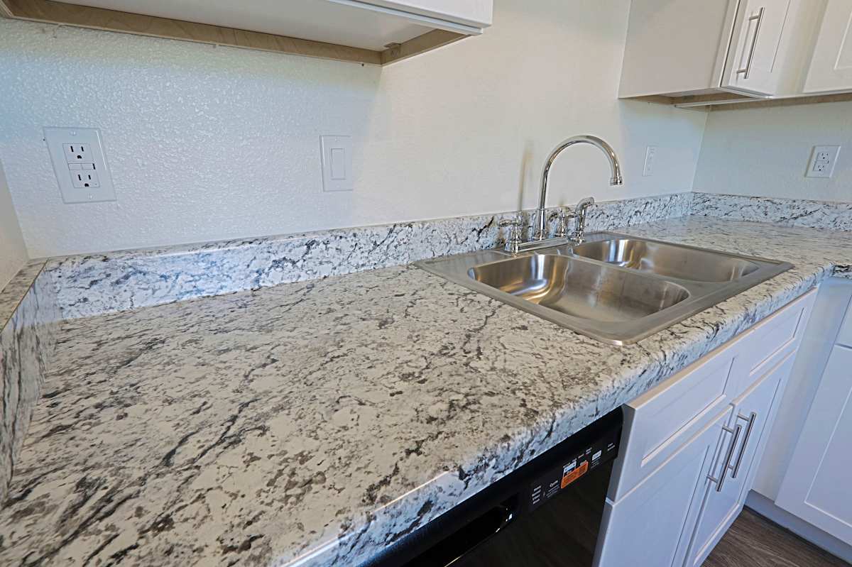 Apartment kitchen — representative home at Cinnabar Square.