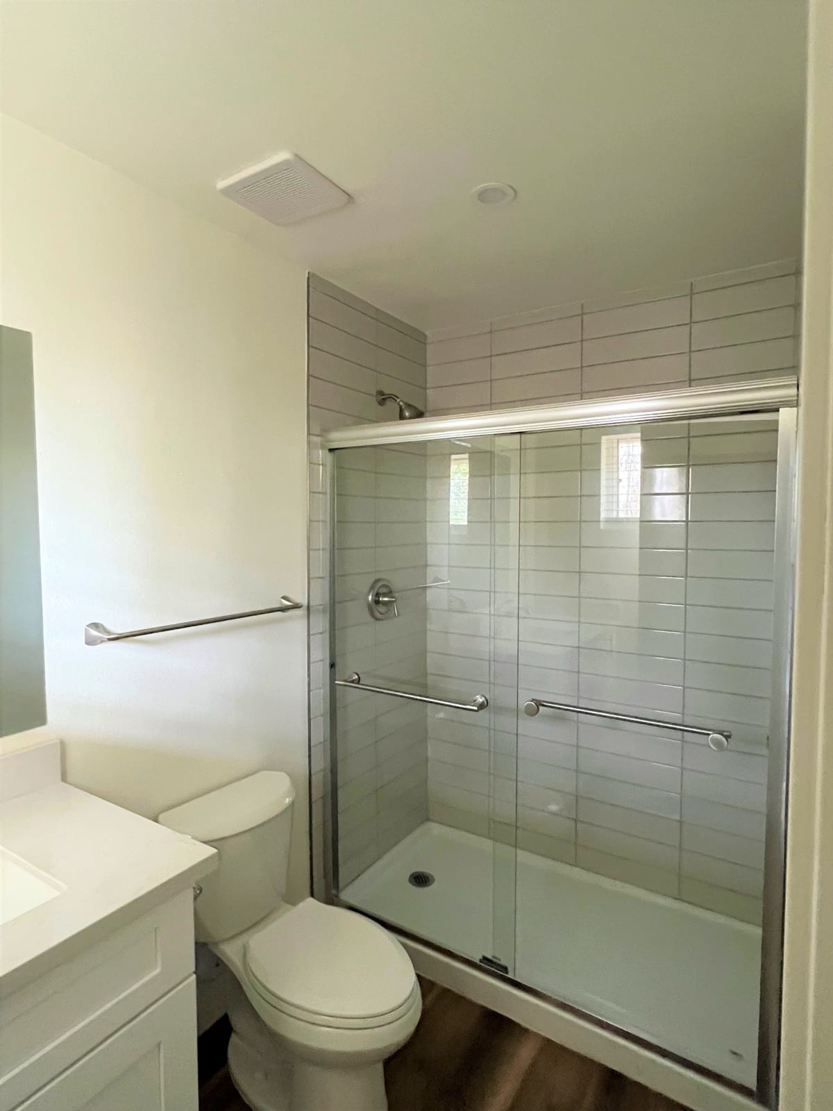 Apartment bathroom — representative home at Pomelo Park.