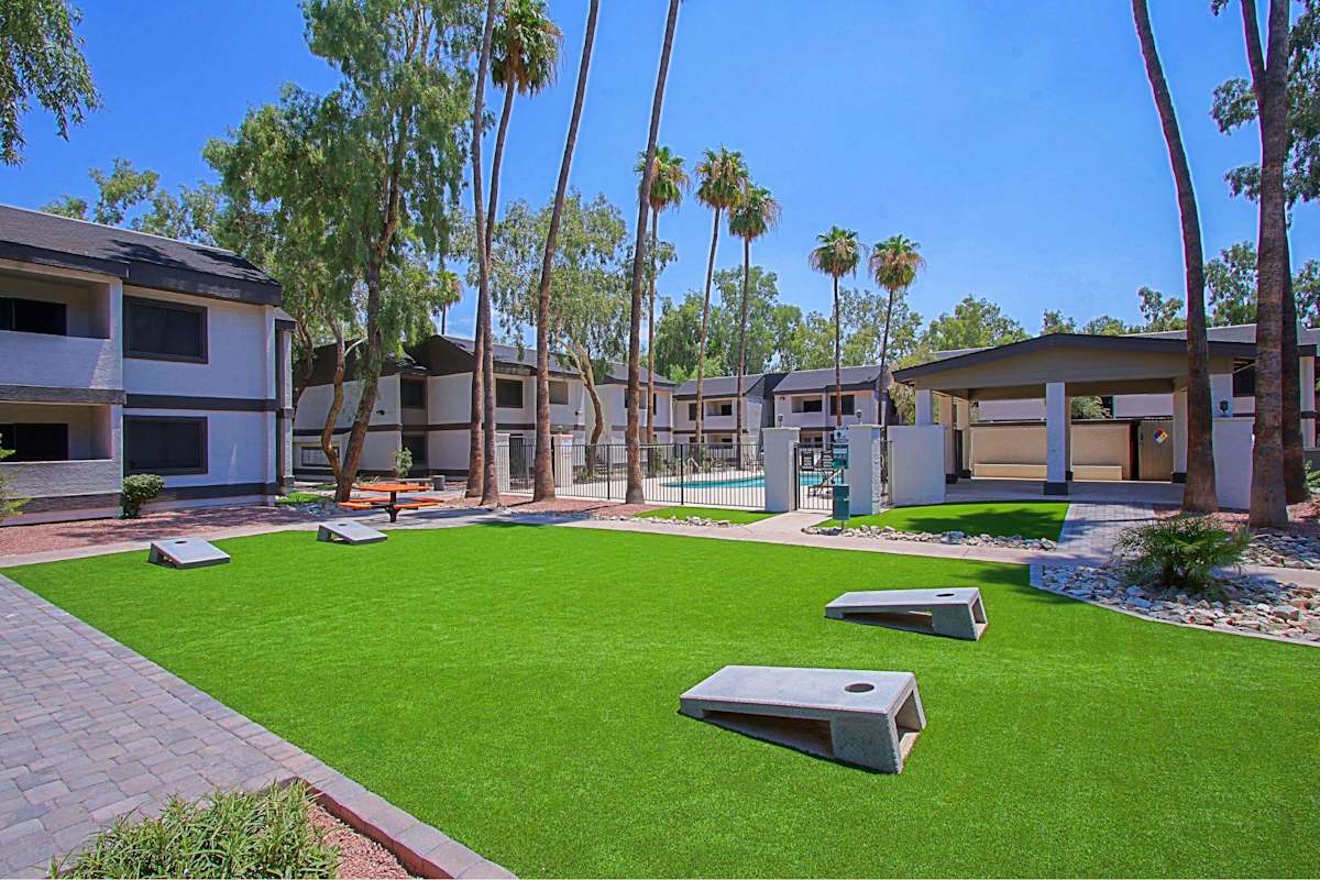 Cornhole game at Aspire Desert West.