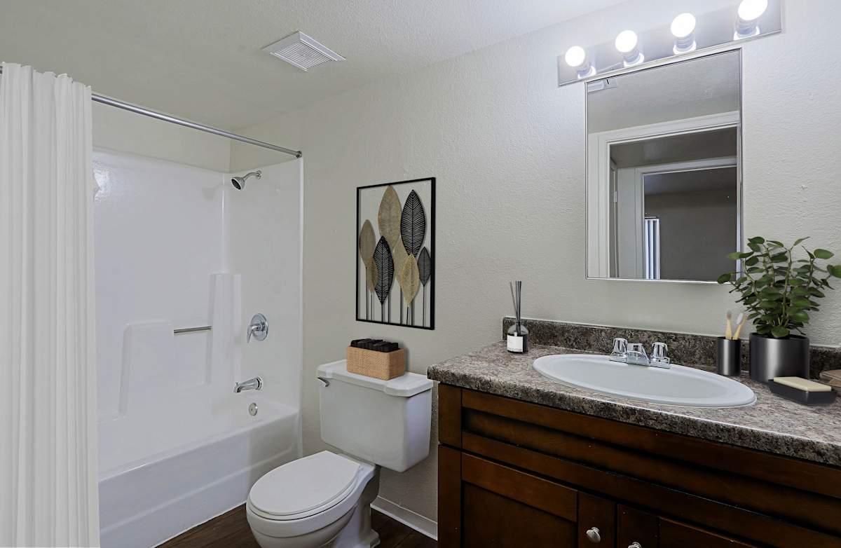 Apartment bathroom — representative home at Sahuaro West Apartments.