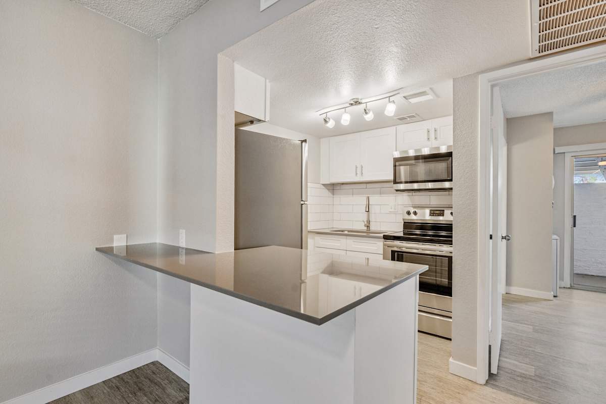 Apartment kitchen — representative home at Tides on East Cactus.