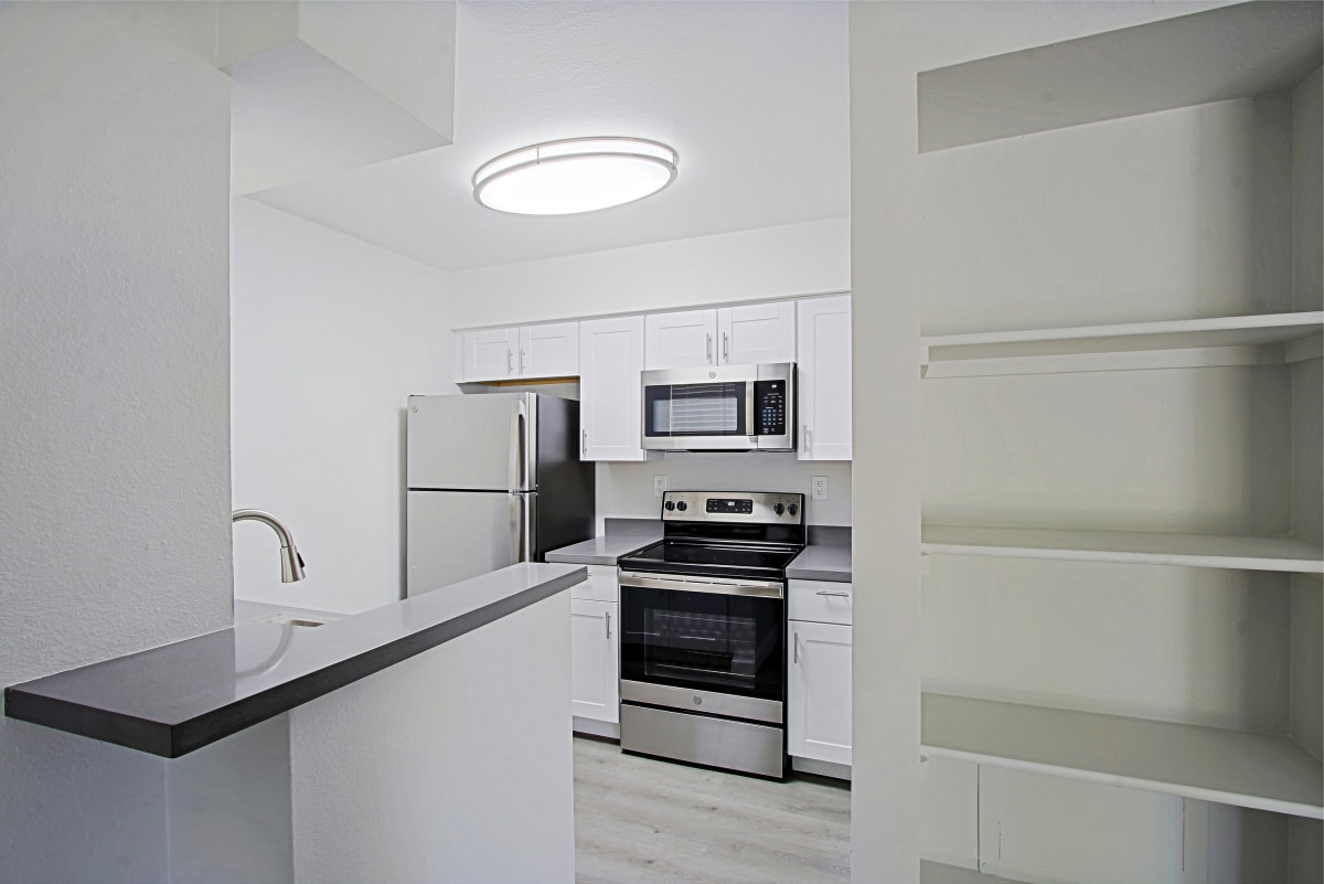 Studio kitchen shown at Northerly Apartments.