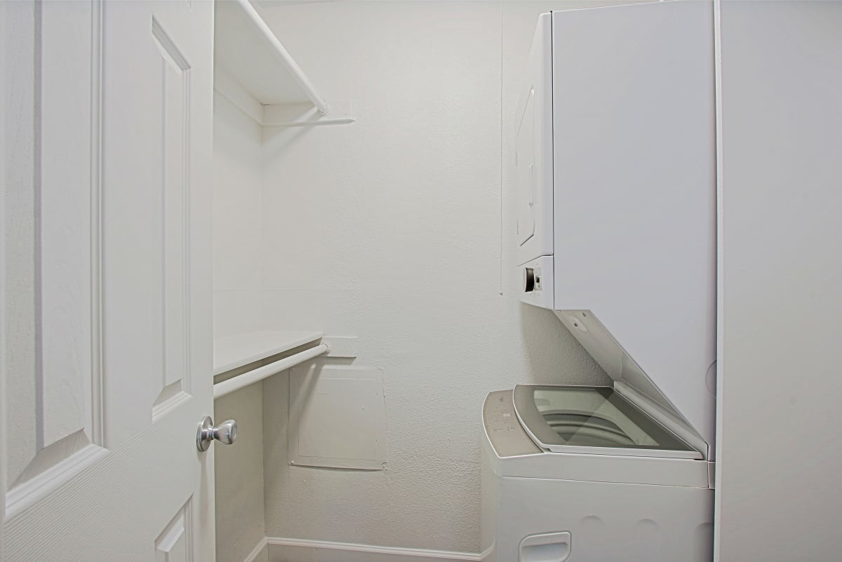 In-home laundry area — representative home at Northerly Apartments.