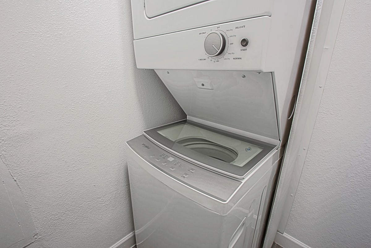 In-home laundry area — representative home at Northerly Apartments.