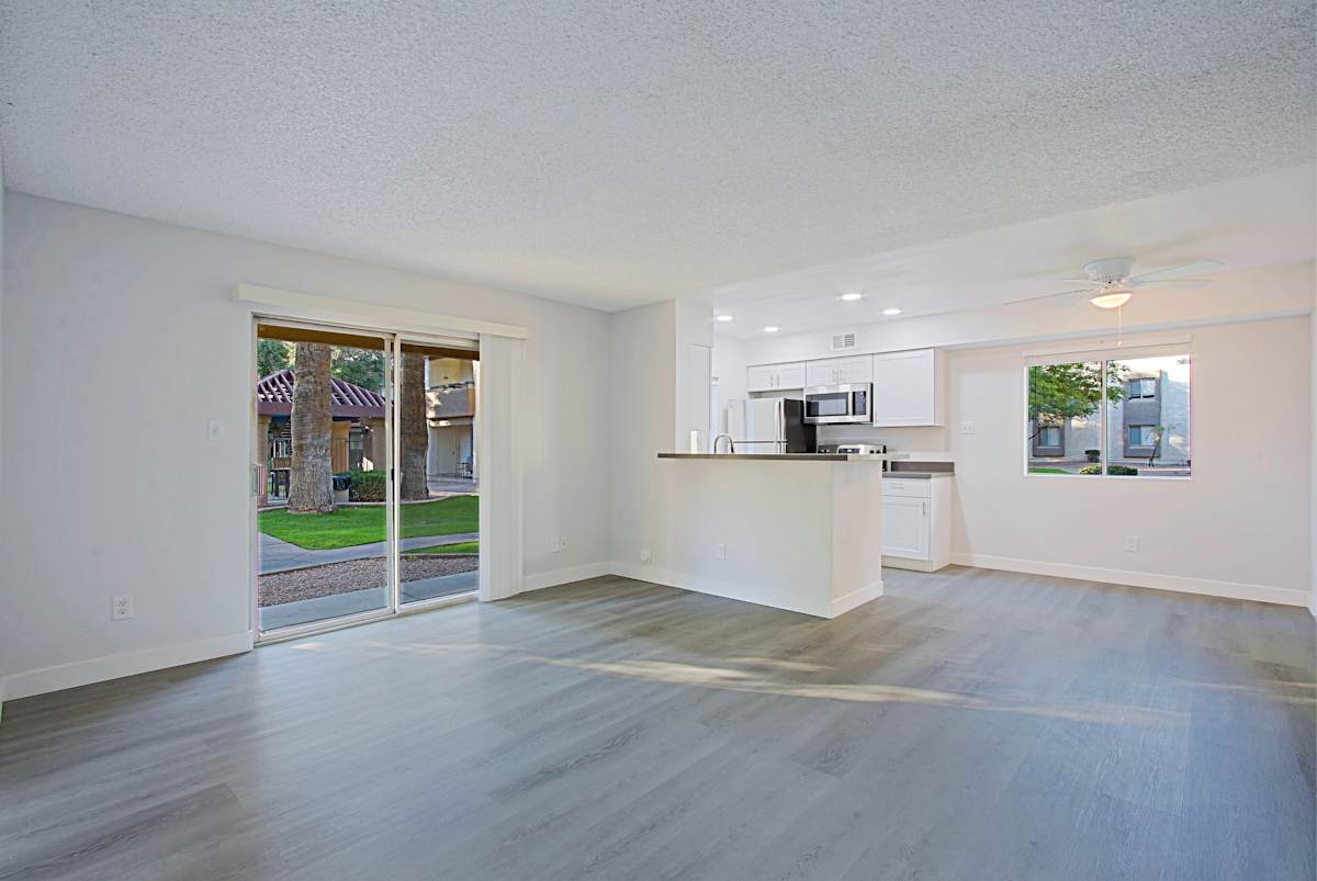 Unfurnished studio living area and kitchen shown at Northerly Apartments.